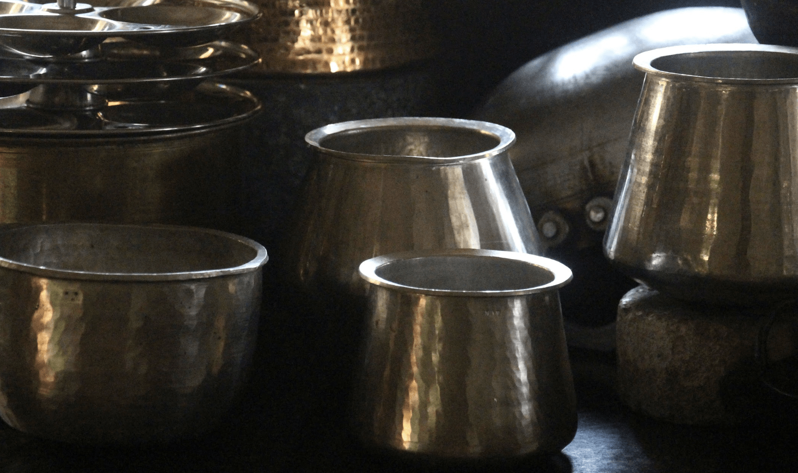 Eeya Chombu (Tin Vessel) cooking in eeyam